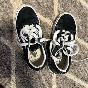 Black and white kids Vans shoes